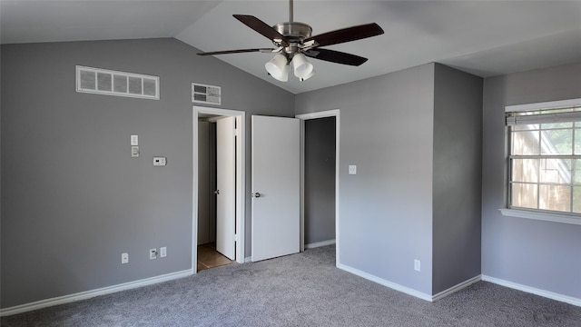 2405 Northlake Ct, Irving, TX 75038 - unfurnished bedroom with lofted ceiling, carpet flooring, baseboards, and ceiling fan