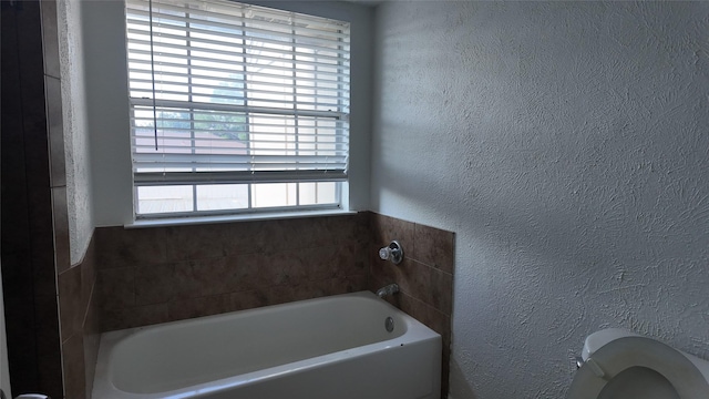 2405 Northlake Ct, Irving, TX 75038 - full bathroom featuring a bath and toilet