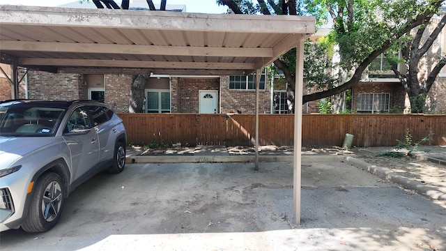 2405 Northlake Ct, Irving, TX 75038 - exterior space with brick siding and covered parking