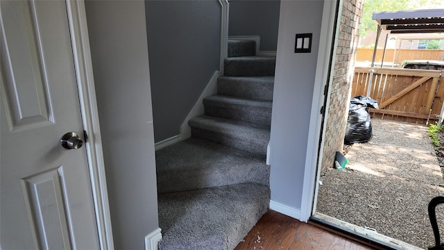2405 Northlake Ct, Irving, TX 75038 - stairs featuring wood finished floors and baseboards