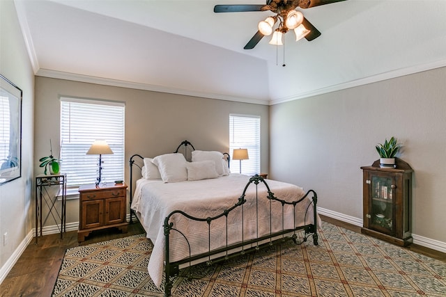 601 Natchez Ct, Hurst, TX 76054 - bedroom with dark wood-style flooring, baseboards, ornamental molding, ceiling fan, and vaulted ceiling