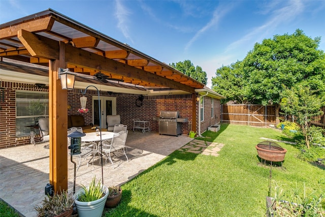 601 Natchez Ct, Hurst, TX 76054 - view of yard featuring an outdoor fire pit, ceiling fan, a patio area, and french doors