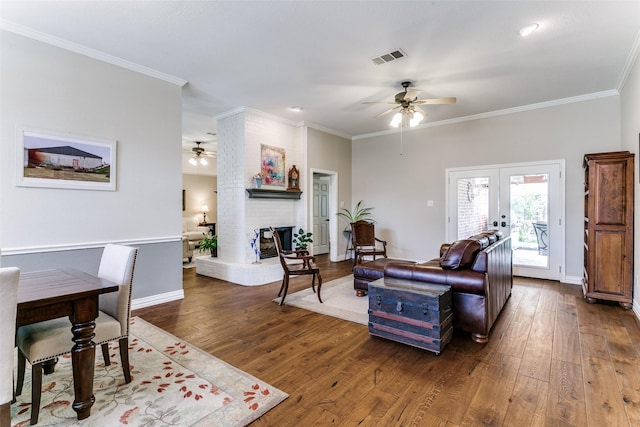 601 Natchez Ct, Hurst, TX 76054 - living room with a ceiling fan, hardwood / wood-style floors, ornamental molding, and french doors