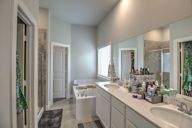 3713 Blessington Dr, Frisco, TX 75036 - full bathroom with a shower stall, a bath, double vanity, and tile patterned flooring