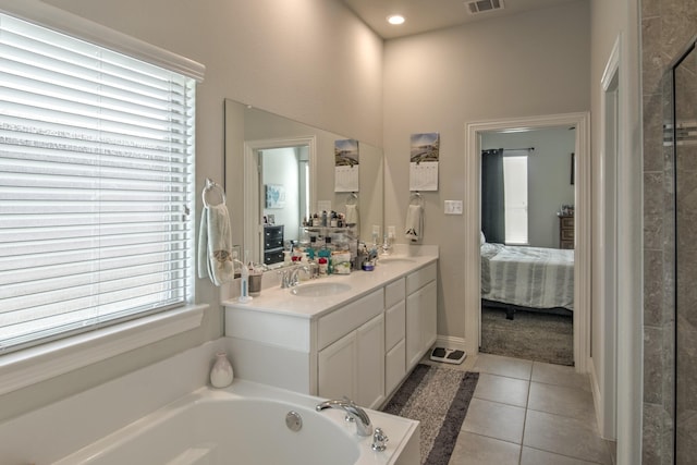 3713 Blessington Dr, Frisco, TX 75036 - ensuite bathroom with double vanity, tile patterned floors, and a garden tub