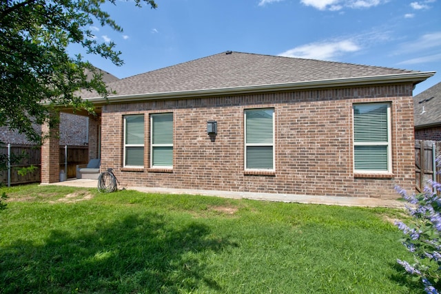3713 Blessington Dr, Frisco, TX 75036 - back of property featuring brick siding and a shingled roof