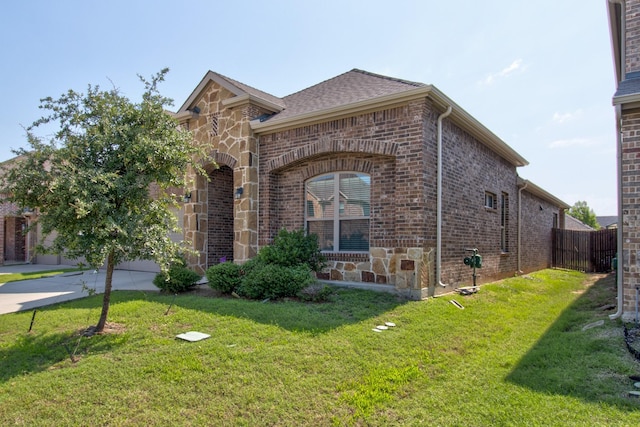 3713 Blessington Dr, Frisco, TX 75036 - view of property exterior with brick siding, driveway, and stone siding
