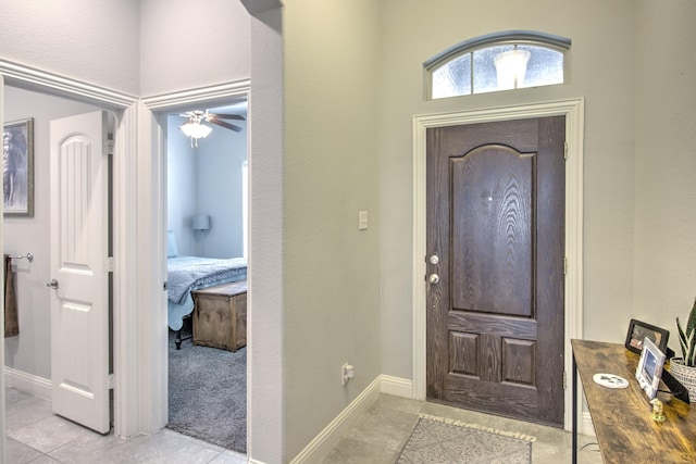 3713 Blessington Dr, Frisco, TX 75036 - entrance foyer with baseboards, light tile patterned floors, and a ceiling fan