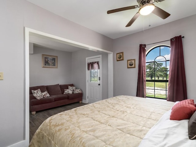 1501 N Business 45, Corsicana, TX 75110 - bedroom with wood finished floors, baseboards, and a ceiling fan