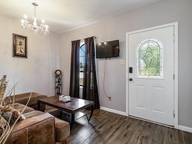 1501 N Business 45, Corsicana, TX 75110 - living room featuring dark wood-type flooring, a chandelier, and baseboards