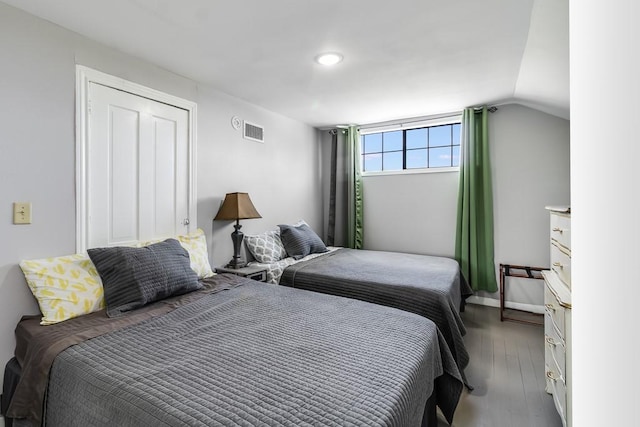1501 N Business 45, Corsicana, TX 75110 - bedroom featuring wood finished floors, baseboards, and vaulted ceiling