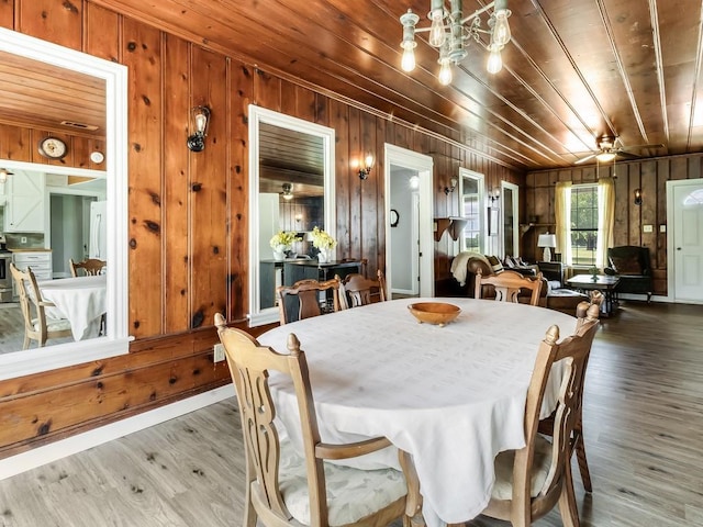 1501 N Business 45, Corsicana, TX 75110 - dining space with wood walls, wood finished floors, and wood ceiling