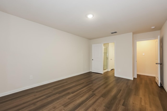 336 Bounding Main St, Gun Barrel City, TX 75156 - unfurnished bedroom featuring dark wood-style flooring and baseboards