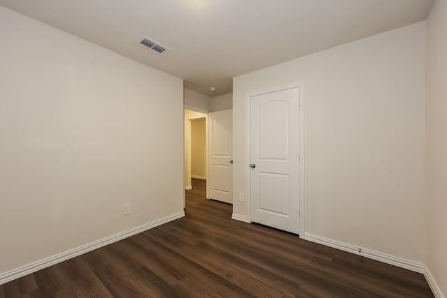 336 Bounding Main St, Gun Barrel City, TX 75156 - empty room featuring baseboards and dark wood finished floors