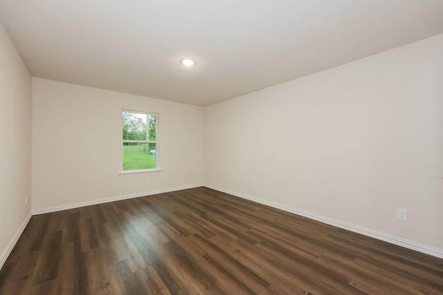 336 Bounding Main St, Gun Barrel City, TX 75156 - empty room with dark wood-style floors, baseboards, and recessed lighting
