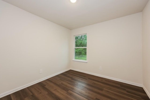 336 Bounding Main St, Gun Barrel City, TX 75156 - empty room with dark wood-style flooring, baseboards, and recessed lighting
