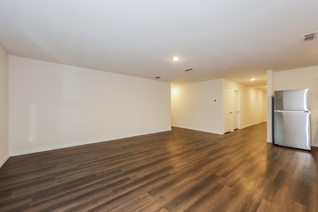 336 Bounding Main St, Gun Barrel City, TX 75156 - empty room featuring recessed lighting, dark wood finished floors, and baseboards