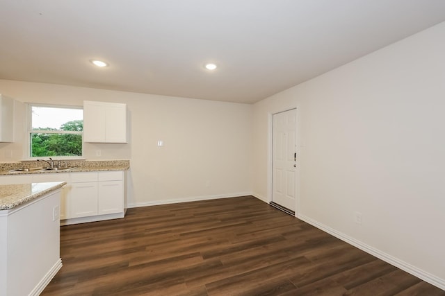 336 Bounding Main St, Gun Barrel City, TX 75156 - kitchen with a sink, light stone counters, white cabinets, dark wood-style flooring, and recessed lighting