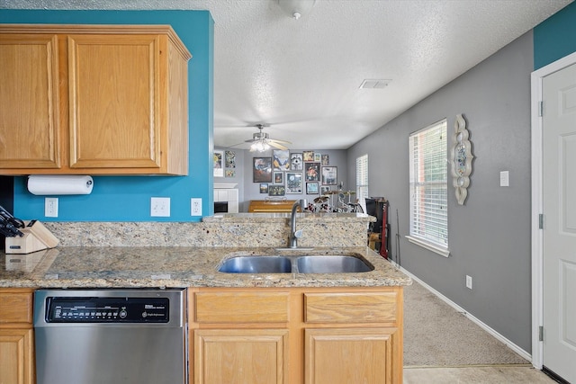 521 Ryan St, Saginaw, TX 76179 - kitchen featuring dishwasher, a sink, ceiling fan, a peninsula, and light colored carpet