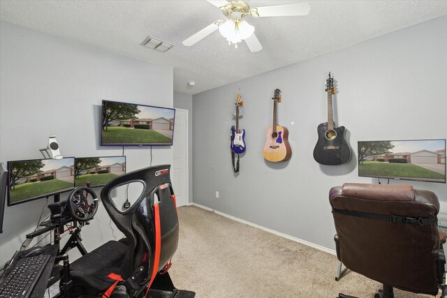 521 Ryan St, Saginaw, TX 76179 - exercise room with carpet, ceiling fan, a textured ceiling, and baseboards