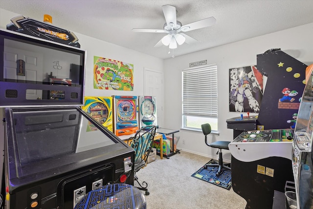 521 Ryan St, Saginaw, TX 76179 - game room featuring carpet flooring, a ceiling fan, baseboards, and a textured ceiling