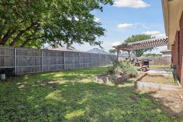 521 Ryan St, Saginaw, TX 76179 - view of yard featuring a vegetable garden