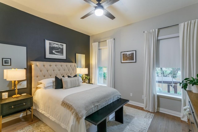 6501 Glenhope Cir S, Colleyville, TX 76034 - bedroom with wood finished floors, baseboards, and a ceiling fan