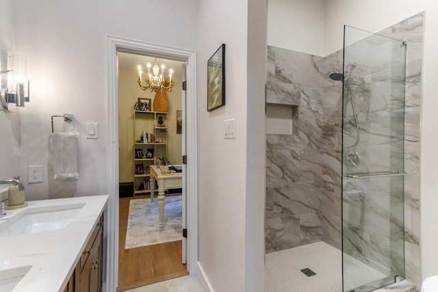 6501 Glenhope Cir S, Colleyville, TX 76034 - full bathroom featuring a chandelier, a marble finish shower, and double vanity