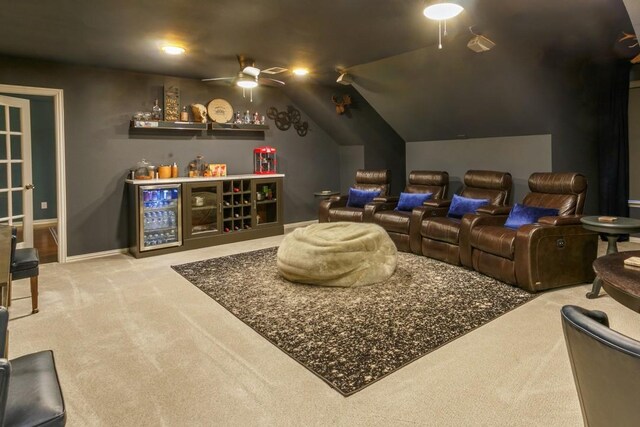 6501 Glenhope Cir S, Colleyville, TX 76034 - carpeted cinema with a bar, vaulted ceiling, a ceiling fan, baseboards, and wine cooler