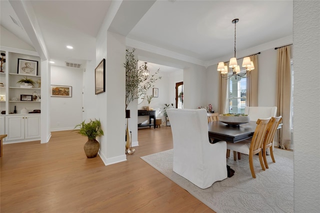 6501 Glenhope Cir S, Colleyville, TX 76034 - dining area with a chandelier, light wood-type flooring, crown molding, baseboards, and recessed lighting