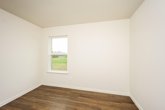 819 S Sutton St, Mabank, TX 75147 - spare room featuring dark wood-style flooring and baseboards