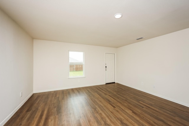 819 S Sutton St, Mabank, TX 75147 - empty room featuring dark wood-style flooring and baseboards