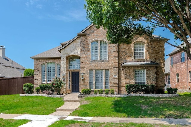 5909 Woodwind Dr, Plano, TX 75093 - view of front of house featuring brick siding