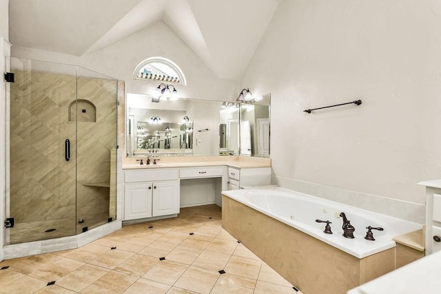 5909 Woodwind Dr, Plano, TX 75093 - bathroom with a jetted tub, vanity, a shower stall, vaulted ceiling, and tile patterned flooring