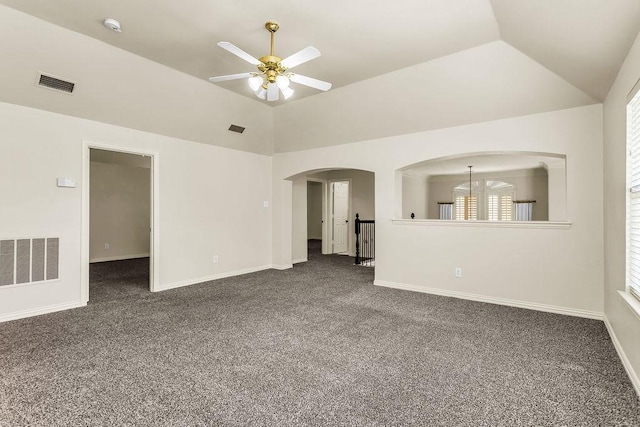 5909 Woodwind Dr, Plano, TX 75093 - empty room with ceiling fan, dark carpet, baseboards, and vaulted ceiling
