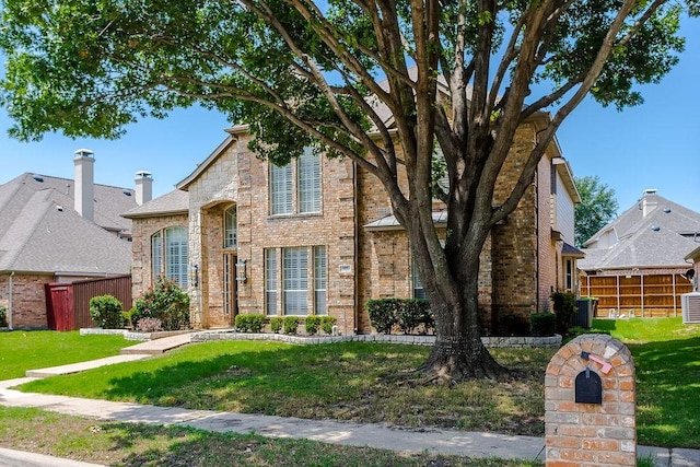 5909 Woodwind Dr, Plano, TX 75093 - view of front of property featuring brick siding
