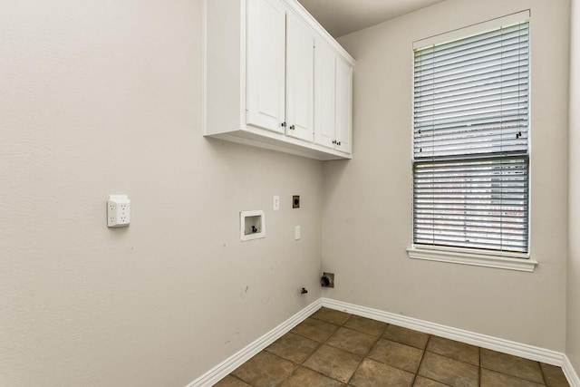 5909 Woodwind Dr, Plano, TX 75093 - laundry area featuring hookup for an electric dryer, cabinet space, baseboards, washer hookup, and dark tile patterned floors