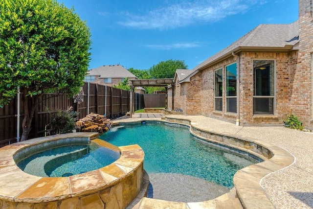 5909 Woodwind Dr, Plano, TX 75093 - view of swimming pool featuring a fenced backyard, a pool with connected hot tub, and a patio area