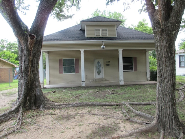 1203 Sewanee Dr, Marlin, TX 76661 - bungalow-style home with roof with shingles and a porch