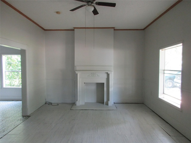 1203 Sewanee Dr, Marlin, TX 76661 - unfurnished living room with crown molding, a ceiling fan, and a fireplace