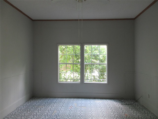 1203 Sewanee Dr, Marlin, TX 76661 - empty room featuring ornamental molding and a ceiling fan