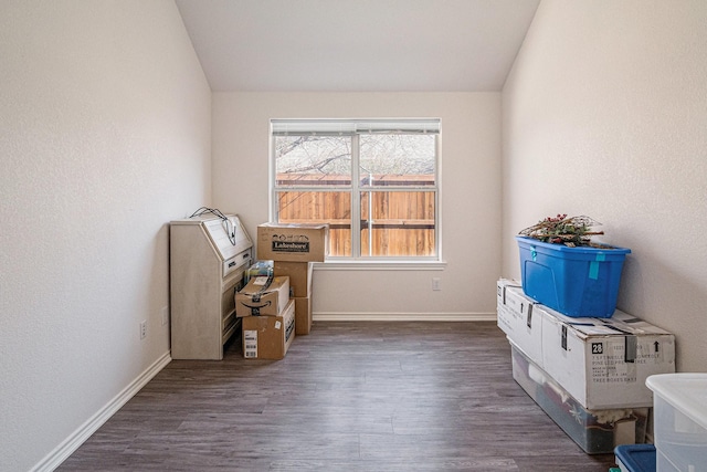 813 Royal Oak Ln, Burleson, TX 76028 - misc room with lofted ceiling, wood finished floors, and baseboards