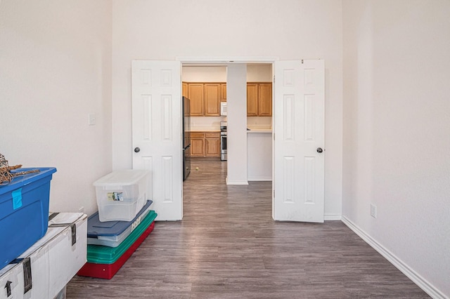 813 Royal Oak Ln, Burleson, TX 76028 - hallway with dark wood finished floors and baseboards