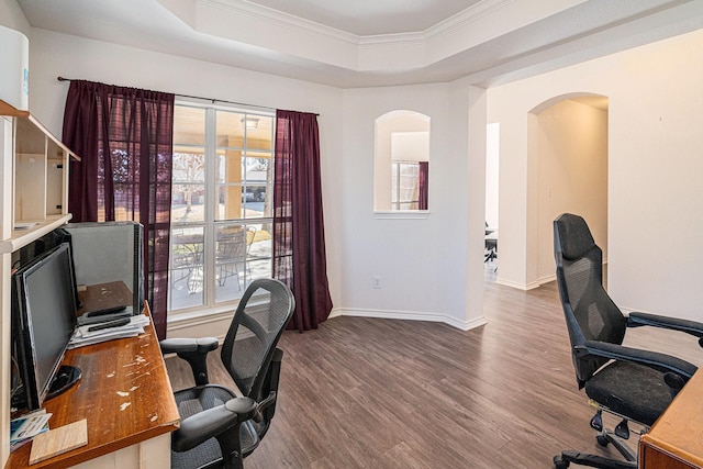 813 Royal Oak Ln, Burleson, TX 76028 - home office with crown molding, arched walkways, wood finished floors, healthy amount of natural light, and a tray ceiling