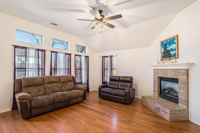 813 Royal Oak Ln, Burleson, TX 76028 - living area featuring ceiling fan, wood finished floors, a fireplace, baseboards, and high vaulted ceiling