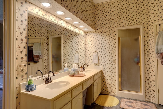 3908 Jamestown Pl, Plano, TX 75023 - full bath featuring wallpapered walls, double vanity, a stall shower, baseboards, and recessed lighting