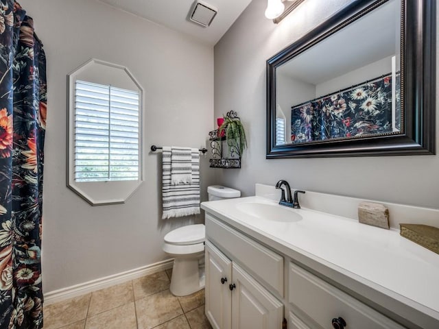 320 Willow Stone St, Denton, TX 76207 - bathroom featuring vanity, toilet, baseboards, and tile patterned flooring