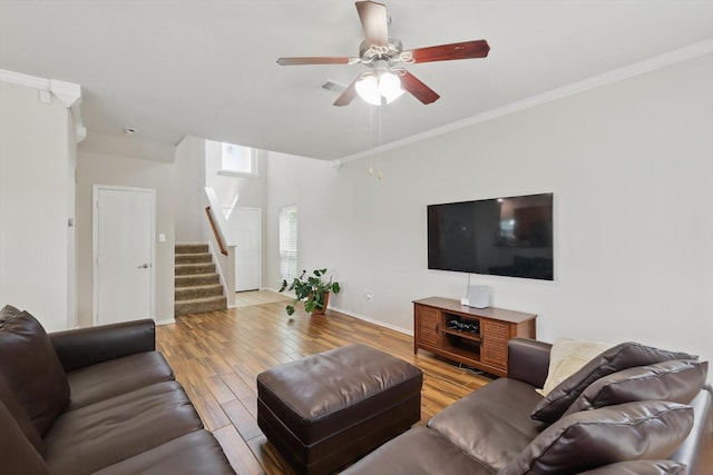 1900 Cassandra Ct, Fort Worth, TX 76131 - living area with stairway, wood finished floors, a ceiling fan, crown molding, and baseboards