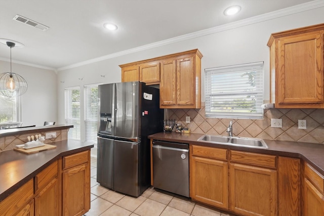 1900 Cassandra Ct, Fort Worth, TX 76131 - kitchen with appliances with stainless steel finishes, a sink, dark countertops, backsplash, and light tile patterned flooring