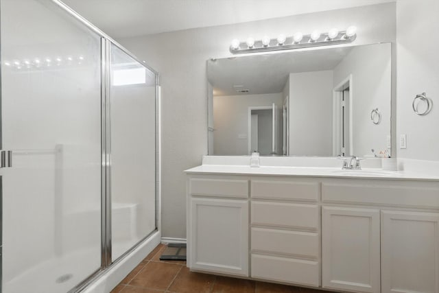 1900 Cassandra Ct, Fort Worth, TX 76131 - full bath featuring a shower stall, double vanity, and tile patterned flooring
